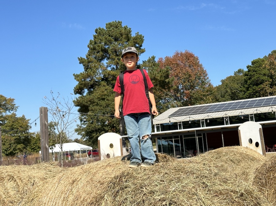 Coleman atop of Round Hay&nbsp;Bales